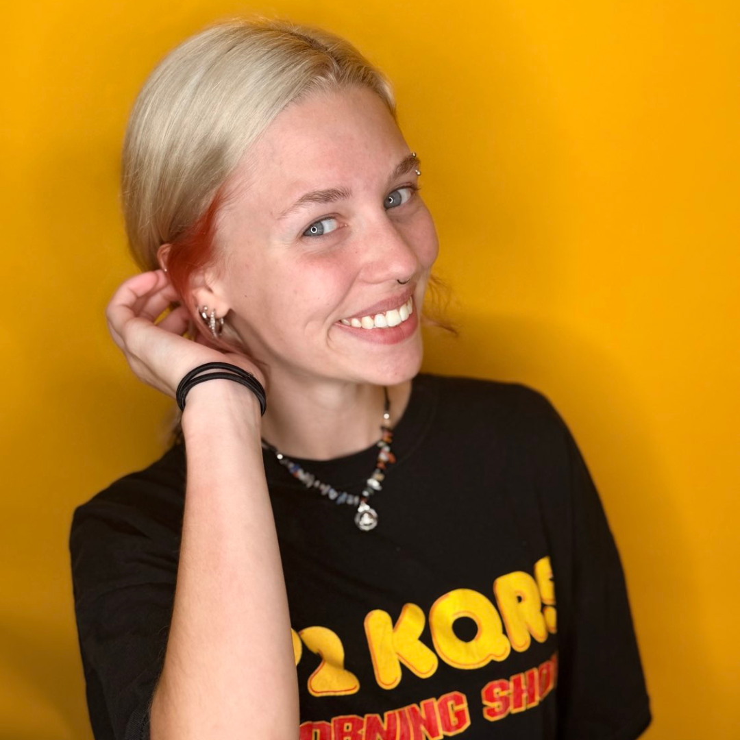 Maddie L, Level 1 Stylist and Color Stylist at Open Hair Space in Minneapolis, specializing in creative haircuts and vivid hair color
